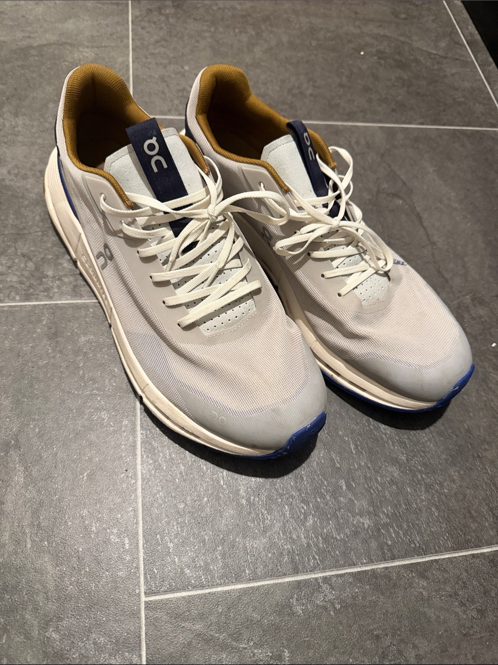 On Running Men's Athletic Shoes — White with Blue and Tan Accents